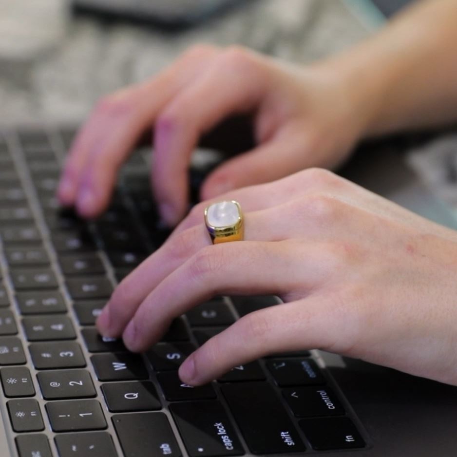  Hands typing on computer keyboard